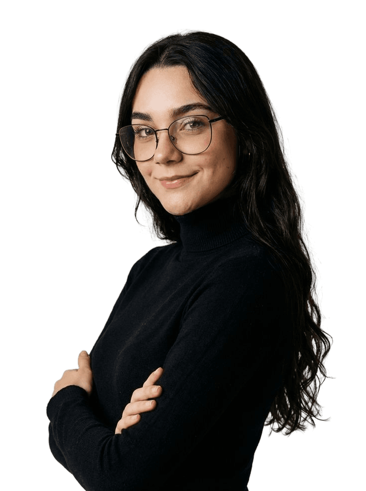 Spanish teacher smiling with her arms crossed